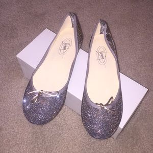 Glitter ballerina slippers.